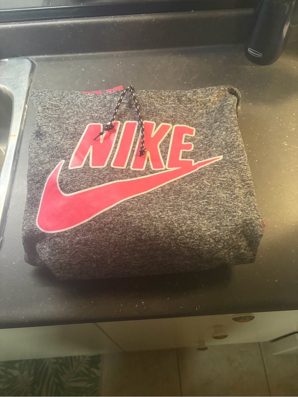 Women’s grey Nike hoodie